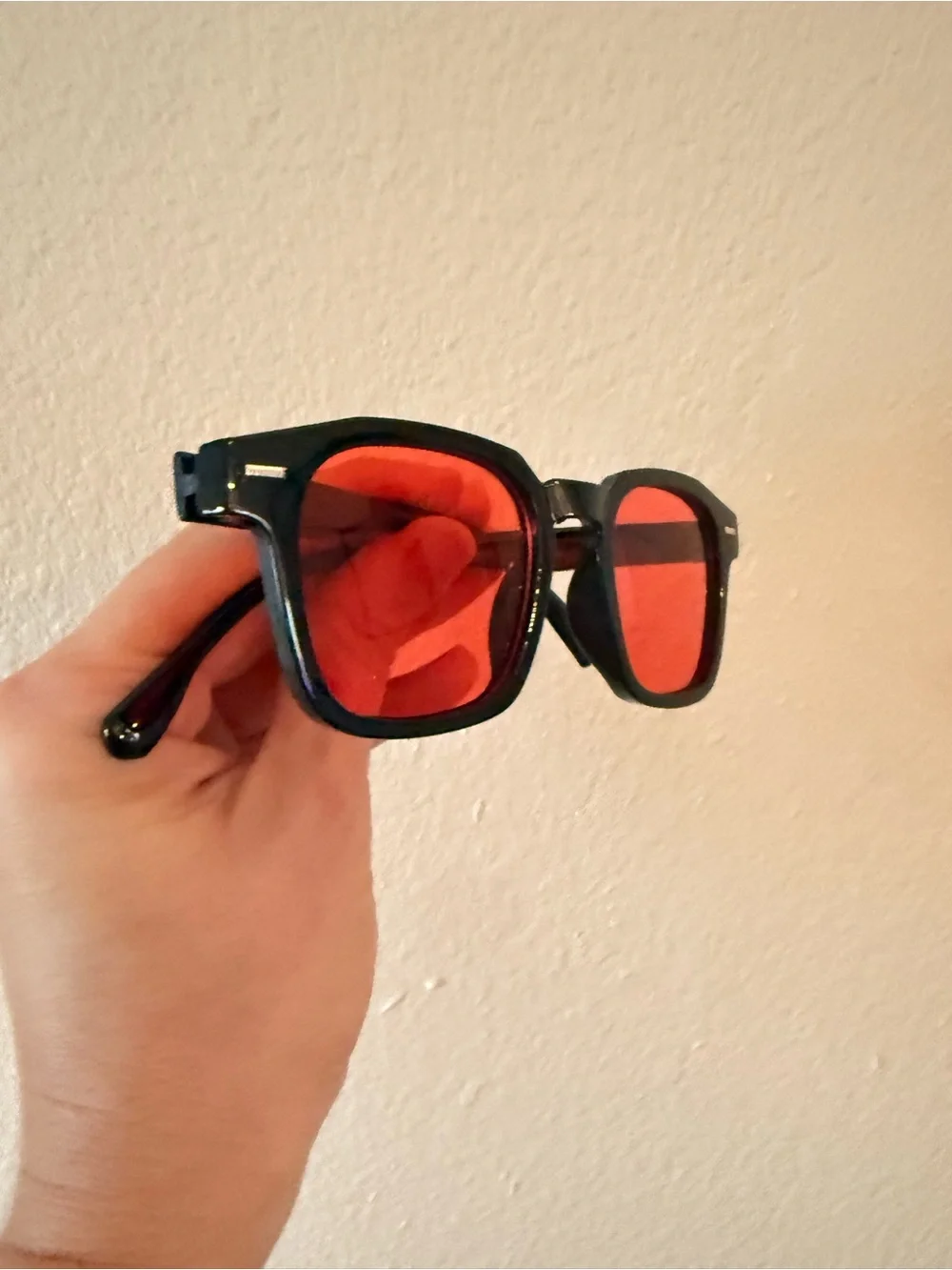 glasses with red lenses